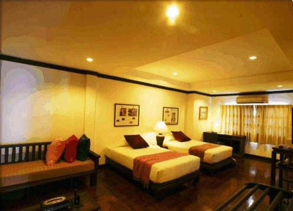 Cucumber Inn Suite Pattaya Zimmer foto