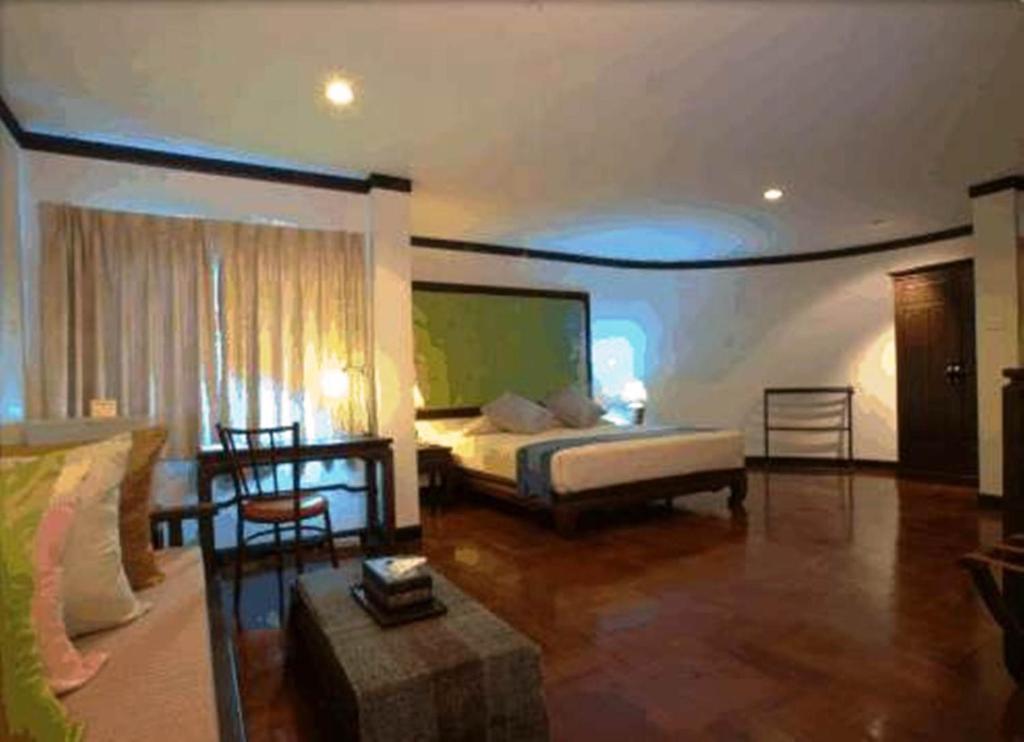 Cucumber Inn Suite Pattaya Zimmer foto